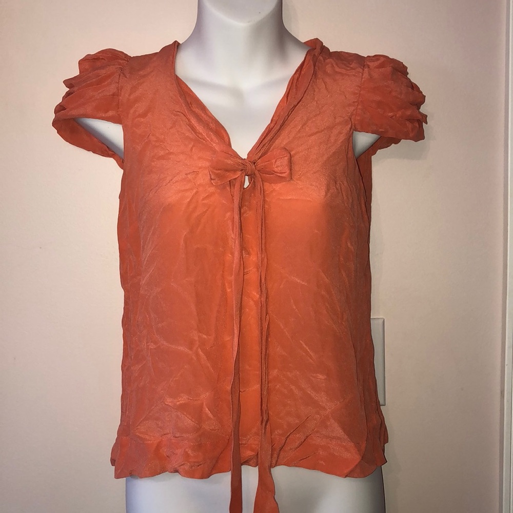 Odille 100% Silk cap sleeves bow front top